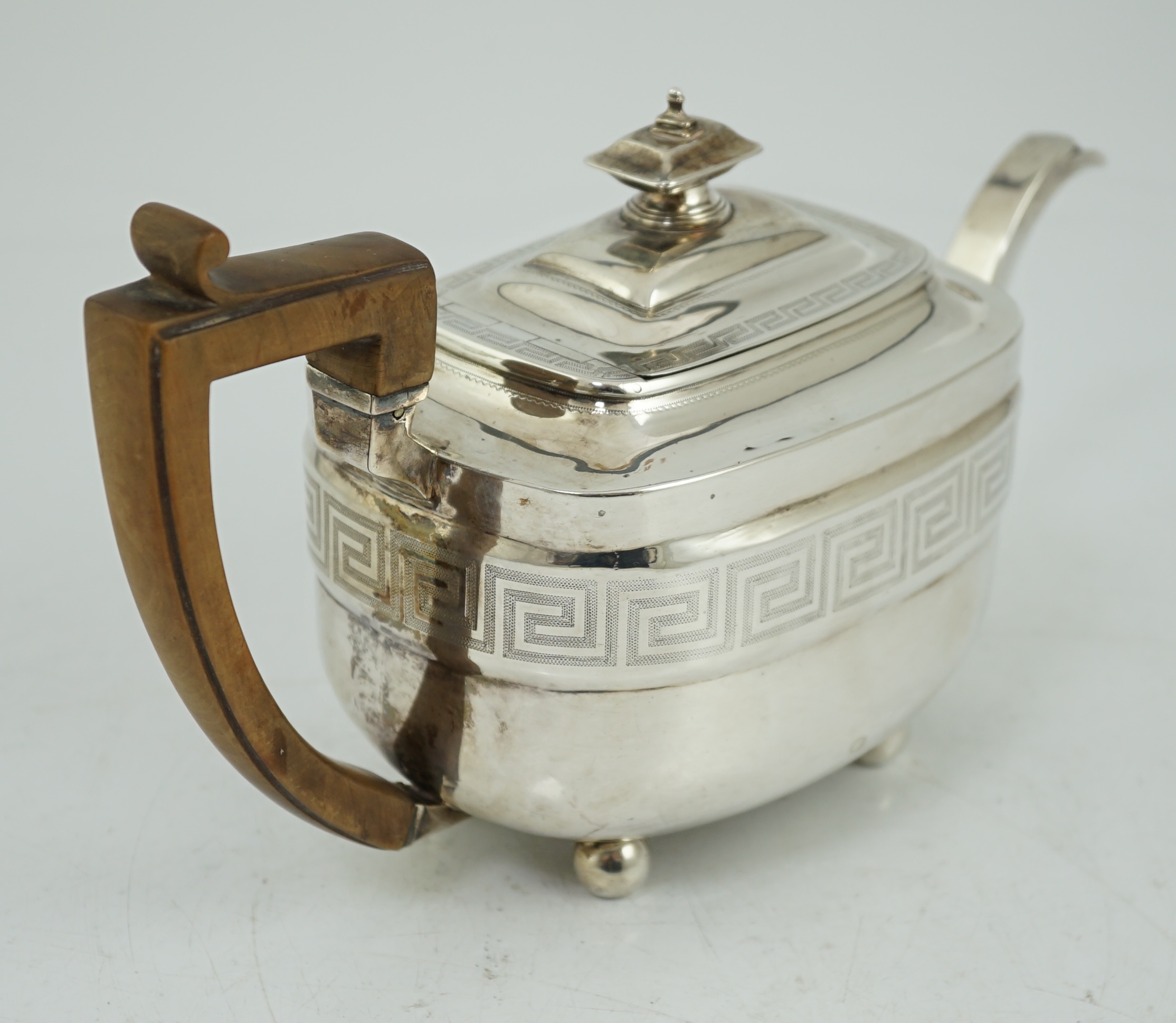 A George III silver shaped rectangular teapot, by Soloman Hougham,`